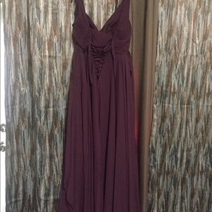 About a 10, maroon color, corset in back